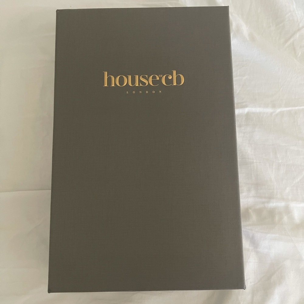 Black and feathered strapless dress